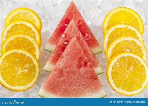 Watermelon Slices Between Orange Slices Stock Photo Image Of