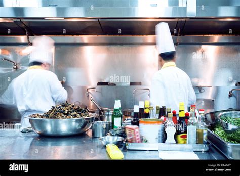 Motion Chefs Of A Restaurant Kitchen Stock Photo Alamy