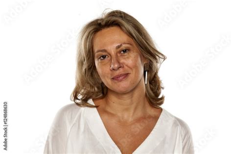 Portrait Of Beautiful And Smiling Middle Aged Woman With No Makeup