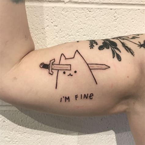 Im Fine Adorable Cat Tattoo On The Bicep Done By Choplogik