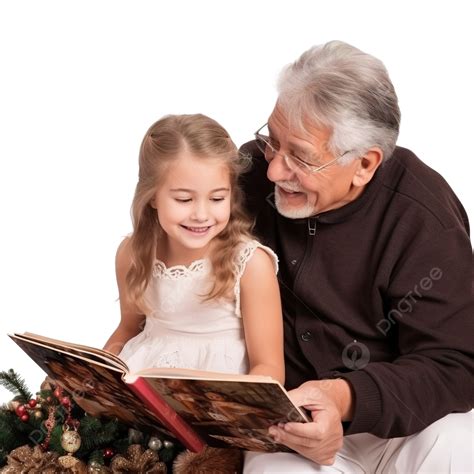 A Menina Com O Avô Olha Para O álbum De Fotos Perto Da árvore De Natal