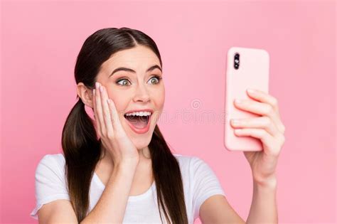 Closeup Photo Of Pretty Cheerful Lady Hold Telephone Hands Excited Emotions Read Positive