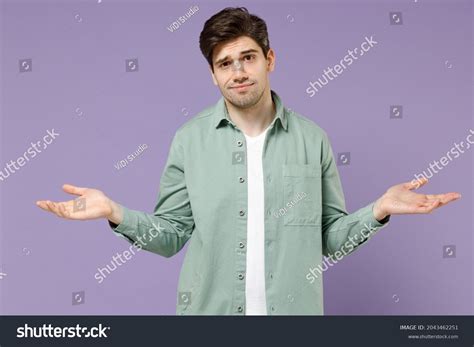 Young Sad Mistaken Confused Displeased Man Stock Photo 2043462251