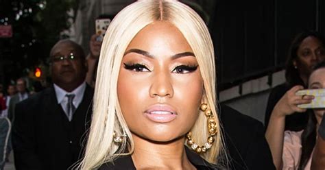 Nicki Minaj Suffers Epic Nip Slip As Bare Boob Erupts From Corset