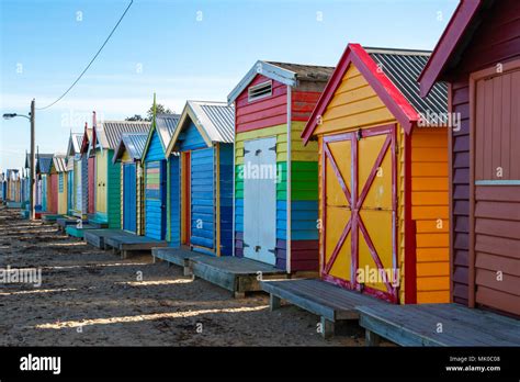 Bright And Colourful Wood Beach Bathing Huts On Brighton Beach Close To