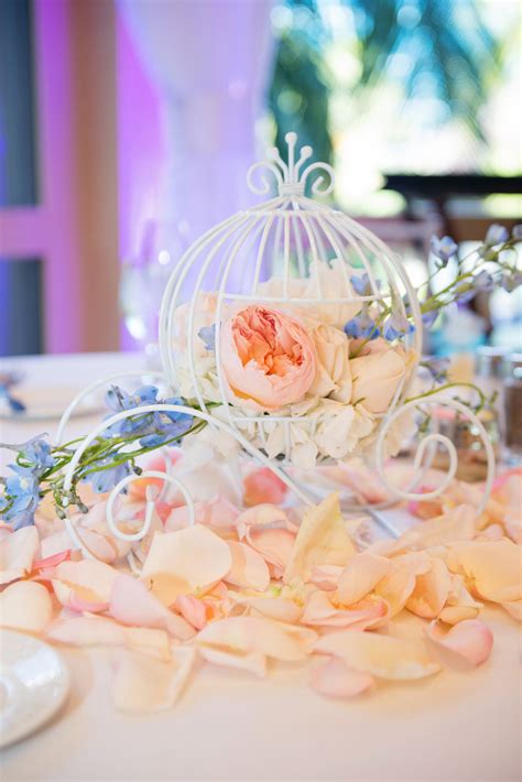 If you love disney (or just want to feel like a. Cinderella Coach reception table decor at a Disneyland ...