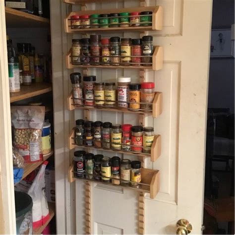 Typically we see door mounted storage used for spices, towel holders, garbage bag dispensers, cutting boards or even magazine storage. Cabinet Door Mounted Organizer in 2020 | Shelves, Metal ...