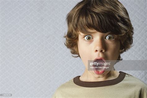 Wide Eyed Boy High Res Stock Photo Getty Images