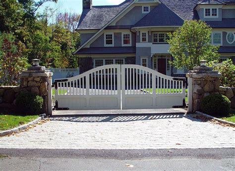 We Designed This Wood Farm Style Driveway Gate To Complement This