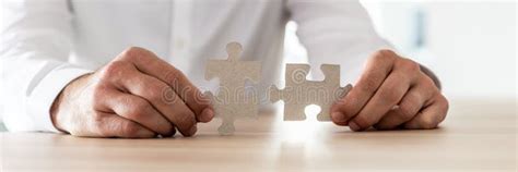 Businessman Holding Matching Puzzle Pieces Stock Photo Image Of Blank