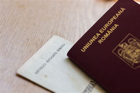 Romanian Passport And Old Birth Certificate Stock Photo Download