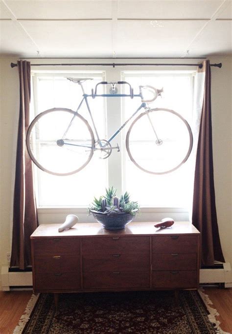 Our office was a mess of bikes. How to build a bicycle wall hanger - DIY projects for ...