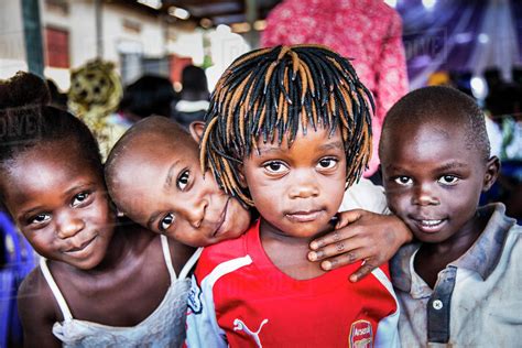 Portrait Of Four Ugandan Children Gulu Uganda Stock Photo Dissolve