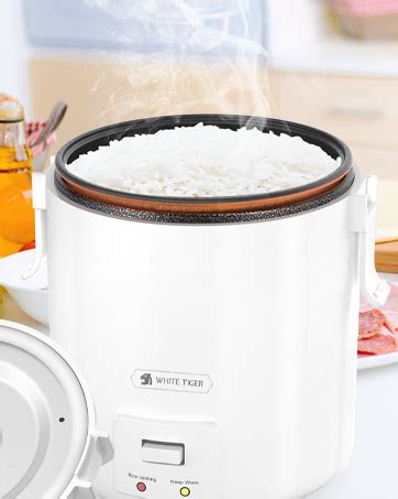Amazon Com L Mini Rice Cooker White Tiger Portable Travel Steamer