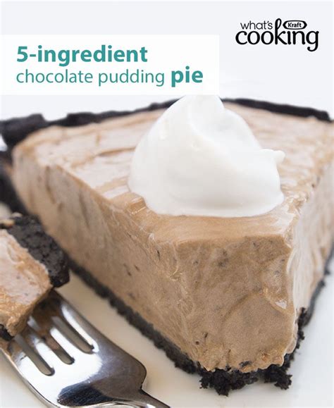 A Piece Of Chocolate Pie With Whipped Cream On Top And A Fork Next To It