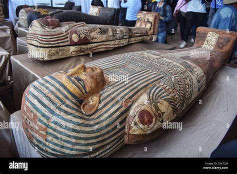 the newly discovered coloured ancient intact and sealed coffins are displayed during a press