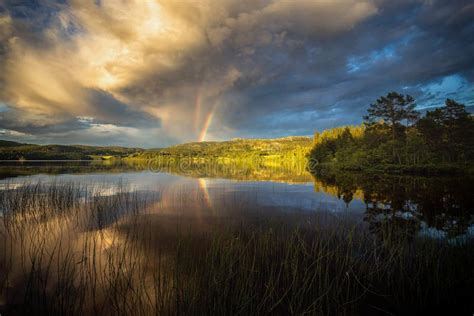 Riple Rainbow Observed Above Jonsvatnet Lake Near Trondheim Sunset