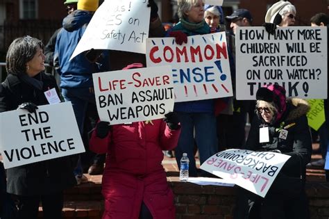 moms demonstrate for gun control armed men stage counter protest in indiana the washington post