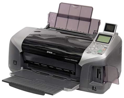 The r320 looks much such as the r200 and r800, having a rounded front and also a gray and silver design. Epson Stylus Photo R320