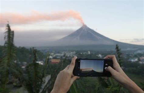 Philippine Volcano Spews Lava Fountains 56000 People Flee Sent Trib