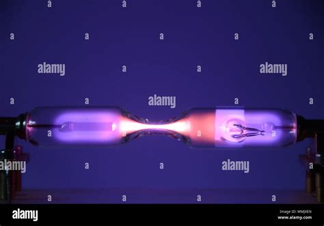 The Inert Gas Helium He Seen In A Discharge Tube Emits Light Due To