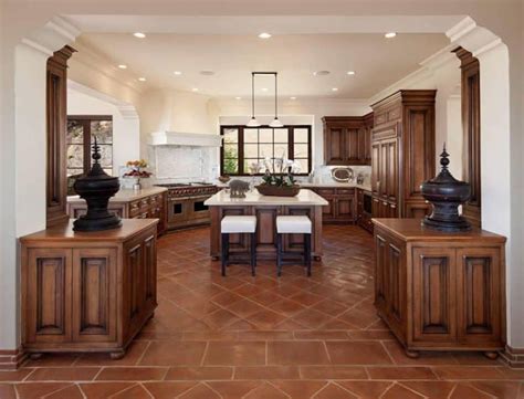 Luxury Kitchen With Center Island Molding And Terra Cotta Floors 800x610 