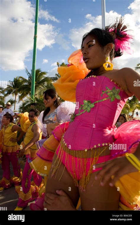 mexican girls wearing carnival clothes dancing and participating at isla mujeres mexican local