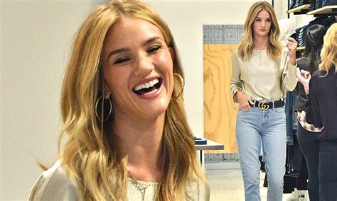 Rosie Huntington Whiteley Stuns In A Satin Top And Vintage Jeans As She