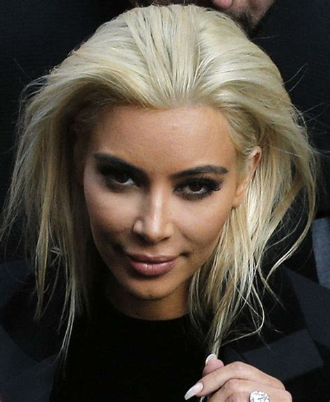 Kim Kardashian Unveils New Blond Hair Color At Paris Fashion Week On Thursday