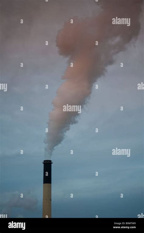 Industrial Smokestack Emitting Pollution Into The Environment Stock
