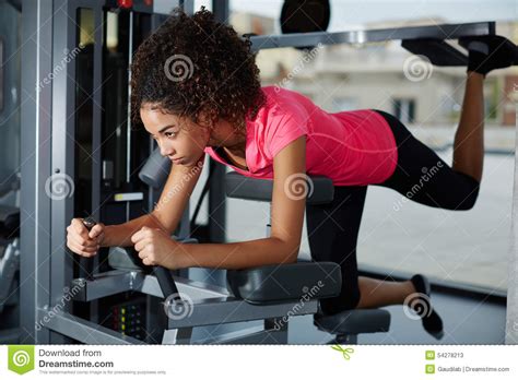 lovely girl shakes her legs in the gym stock image image of lovely american 54278213