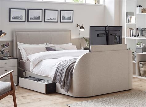 Our Alexander Tv Bed Frame In Slate Grey Or Oatmeal Fabric With A Brand