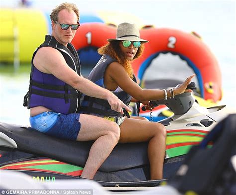 Eve And Maximillion Cooper Ride Jet Ski During Holiday In Barbados
