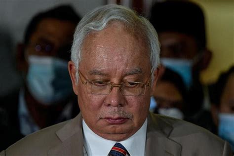 najib s court conviction puts umno biggest party in malaysian government at crossroads the