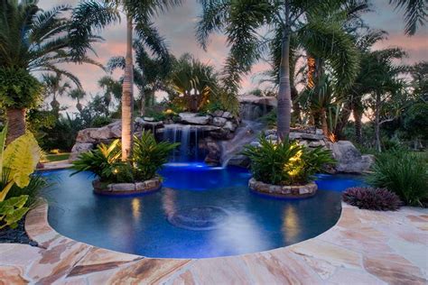 Lagoon Pool And Spa With Large Grotto Waterfall And Slide By Lucas