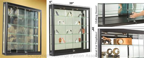 Four Different Views Of A Display Case With Glass Doors