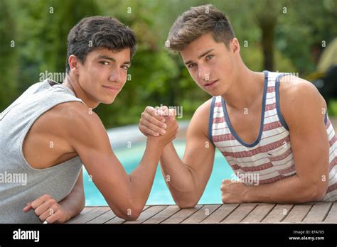 Twin Brothers Arm Wrestling Teenagers Stock Photo Alamy