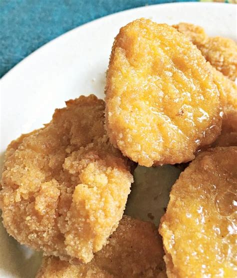 Using your hands, tumble and mix the chicken nuggets, oil and spices until well coated. 25 MINUTE • HOW TO COOK FROZEN CHICKEN NUGGETS • Loaves ...