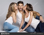 Two women kissing handsome man ⬇ Stock Photo, Image by © kiuikson ...