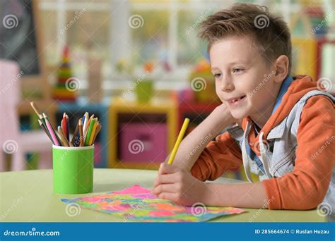 Selective Focus Of Kid Drawing At Desk Stock Photo Image Of