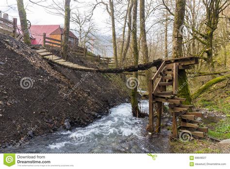 Small Wooden Bridge Over The Mountain Rive Stock Image Image Of