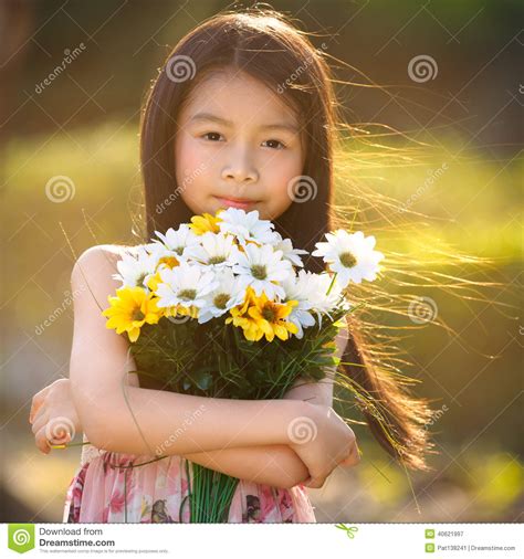 Hold bunch flowers upside down. Hold Bunch Flowers Upside Down - Sad Little Asian Girl ...