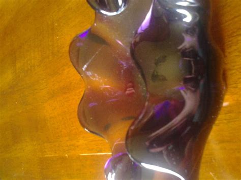 odd shaped purple art glass ashtray maybe murano collectors weekly