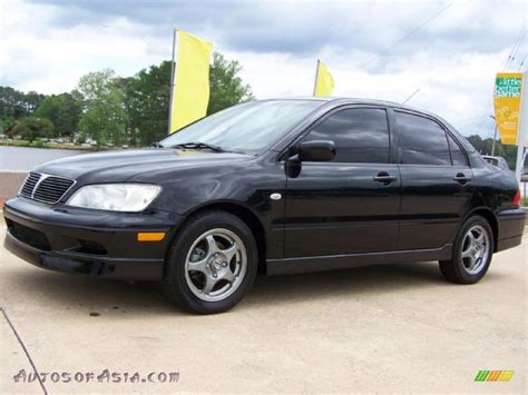Truecar has over 917,194 listings nationwide, updated daily. 2003 Mitsubishi Lancer OZ Rally in Labrador Black Pearl ...
