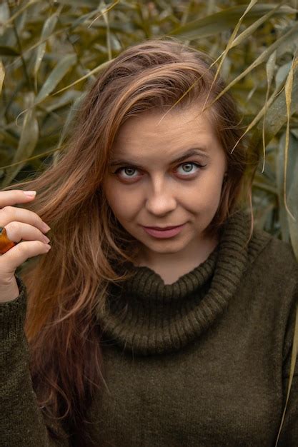 Premium Photo Sexy Leaves Near The Female Mouth The Girl S Tongue Holds The Plant Natural