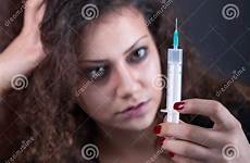 drug addiction syringe dark woman young background female focus preview