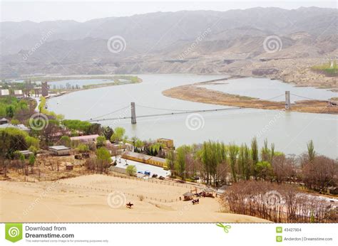 Desert Landscape With Yellow River Editorial Stock Image Image Of