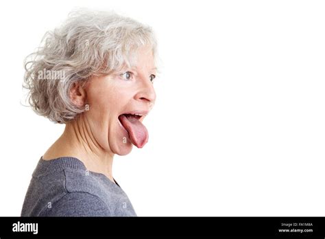 cheeky woman sticking out tongue imágenes recortadas de stock alamy