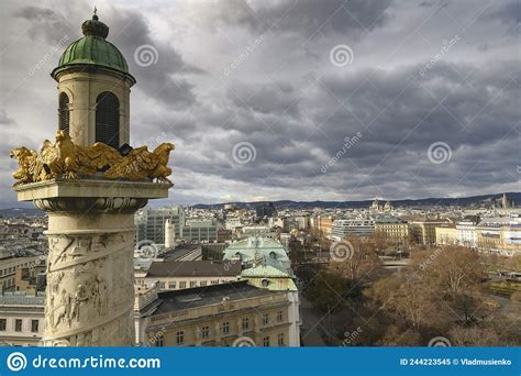 Gold Eagles On The Tower Of Karlskirche And Panoramic View Of Vienna