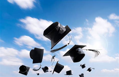 Best Graduation Caps Thrown In The Air Stock Photos Pictures And Royalty